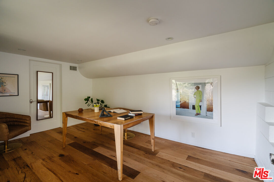 2355 Hermits Glen Los Angeles, CA 90046 - Photo 33 of 45 a room with furniture and wooden floor