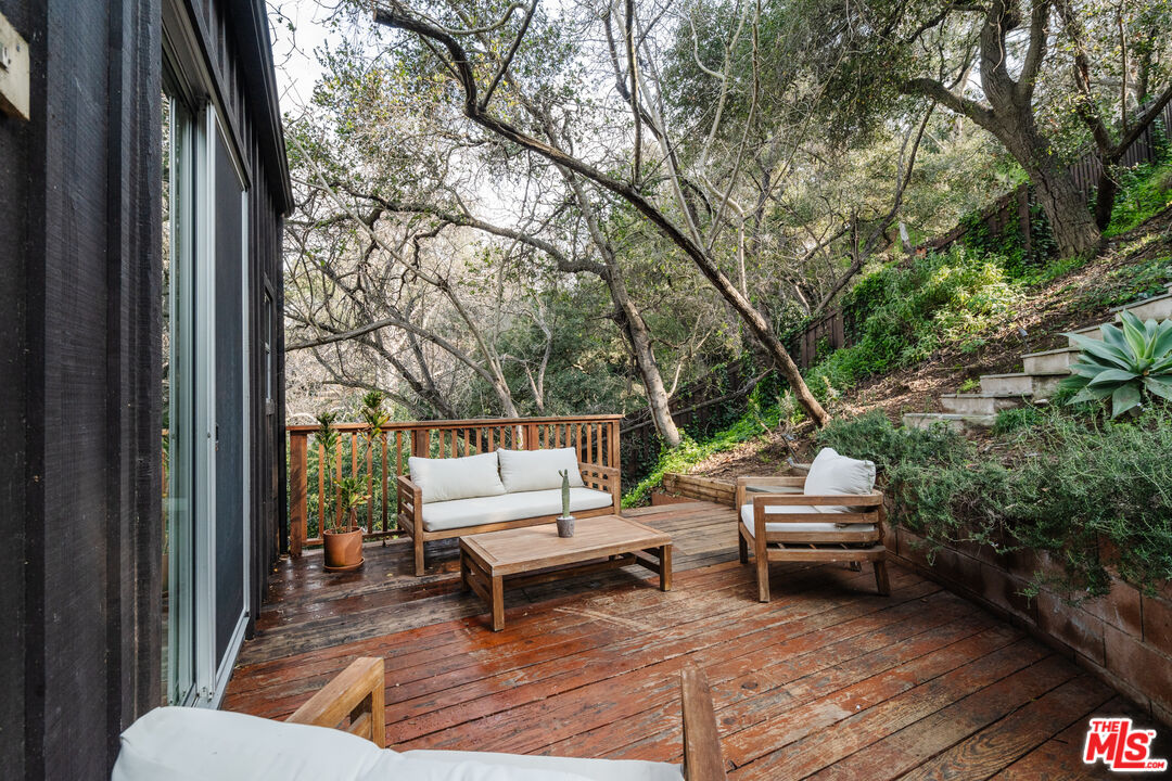 2355 Hermits Glen Los Angeles, CA 90046 - Photo 37 of 45 a house view with a couches in a patio