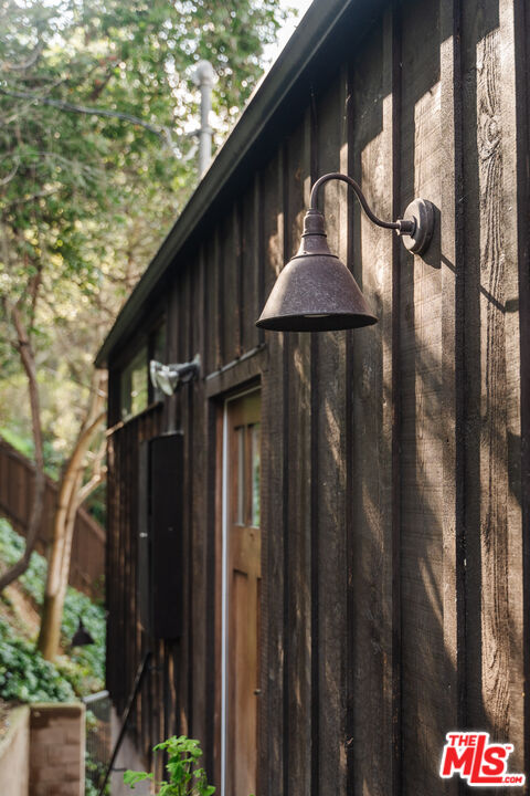 2355 Hermits Glen Los Angeles, CA 90046 - Photo 41 of 45 a couple of potted plants in front of door
