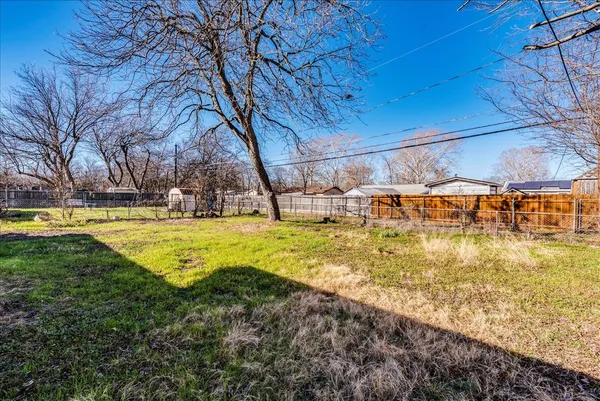 a view of a swimming pool with an outdoor space
