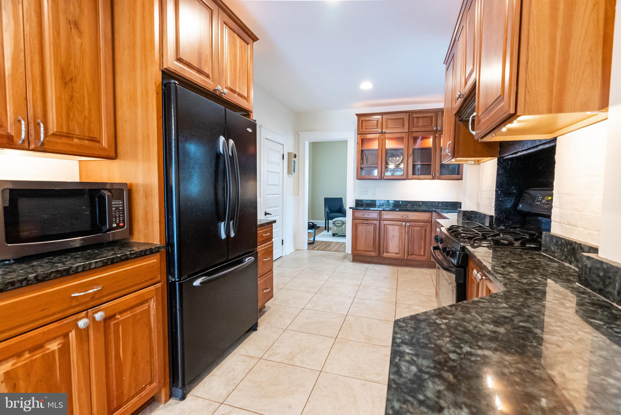 123 Hawthorn Road Baltimore, MD 21210 - Photo 12 of 40 Tons of cabinet space opens to DR and Den
