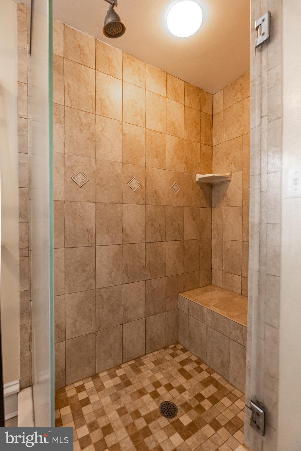 123 Hawthorn Road Baltimore, MD 21210 - Photo 25 of 40 Custom shower in ensuite bathroom