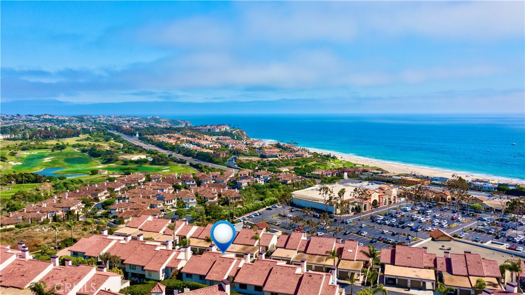 a view of a city with an ocean