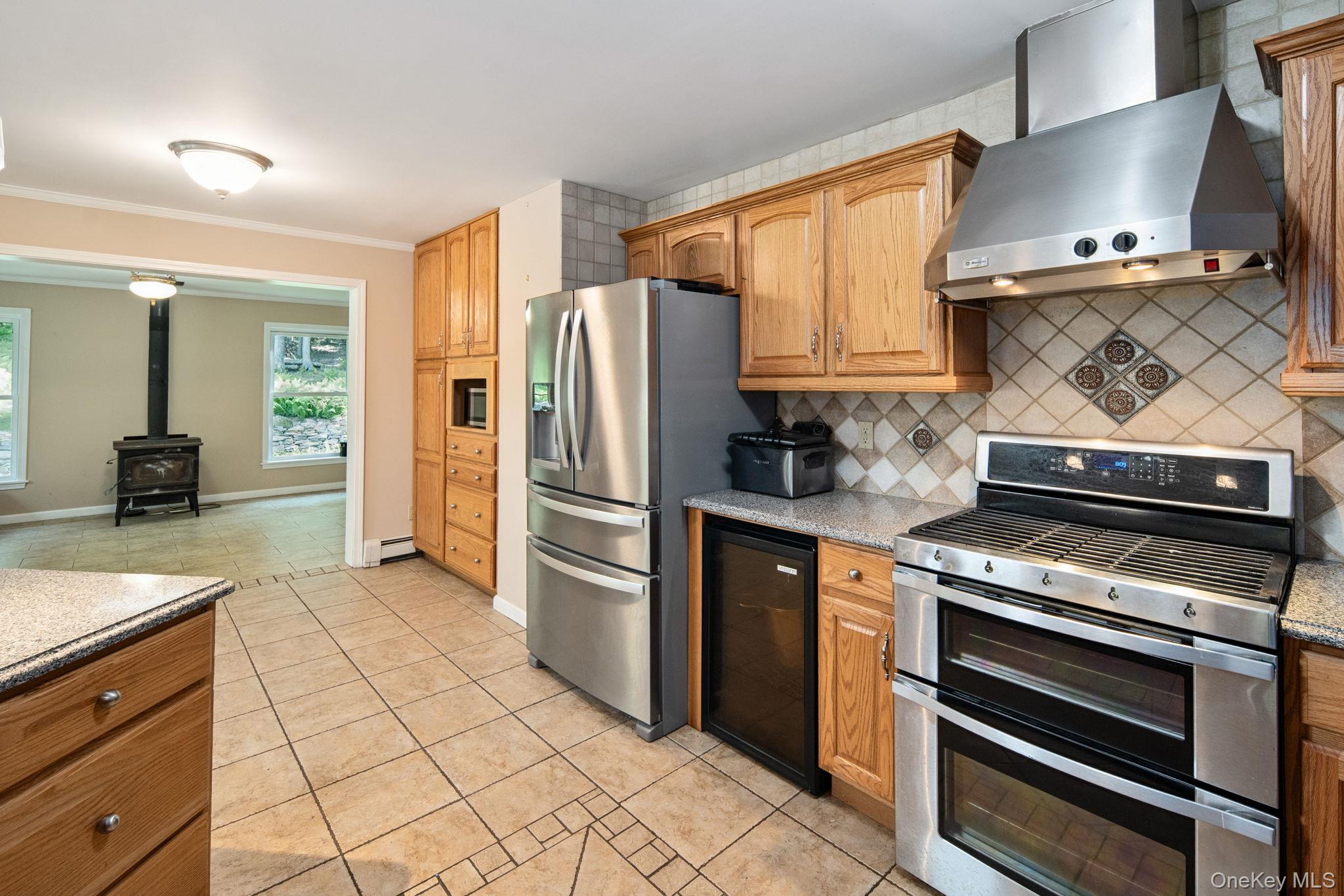 66 Highland Lake Road Eldred, NY 12732 - Photo 21 of 50 a kitchen with appliances and cabinets