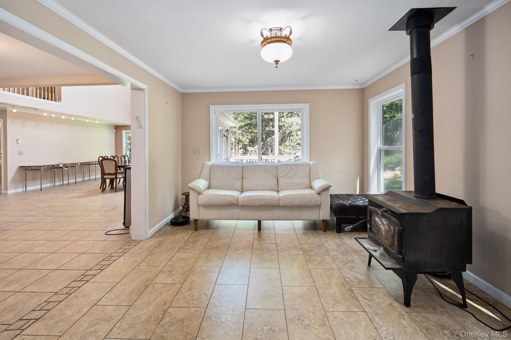 66 Highland Lake Road Eldred, NY 12732 - Photo 23 of 50 a living room with furniture and a couch