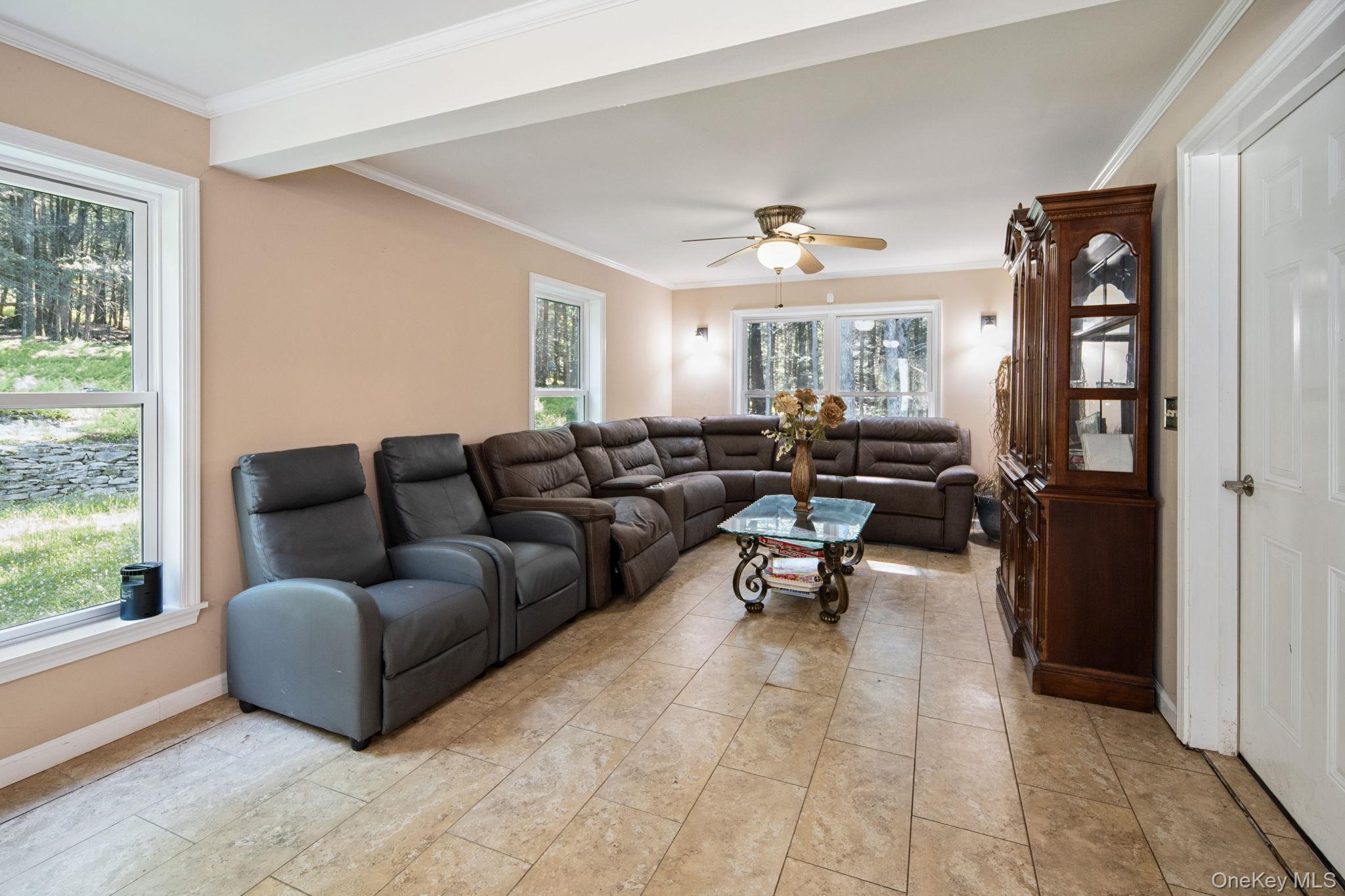 66 Highland Lake Road Eldred, NY 12732 - Photo 24 of 50 a living room with furniture and a window