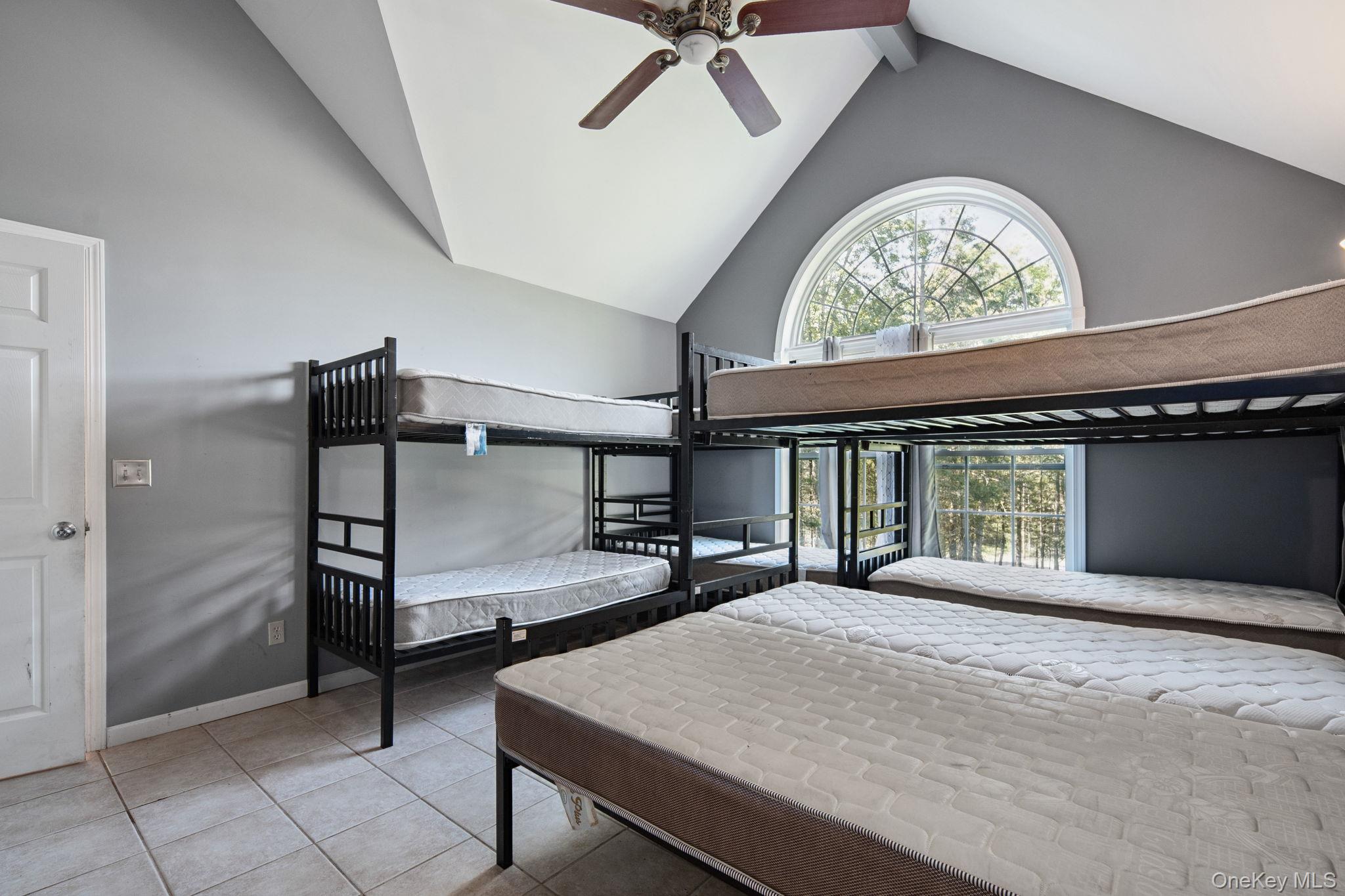 66 Highland Lake Road Eldred, NY 12732 - Photo 29 of 50 a bedroom with furniture and window