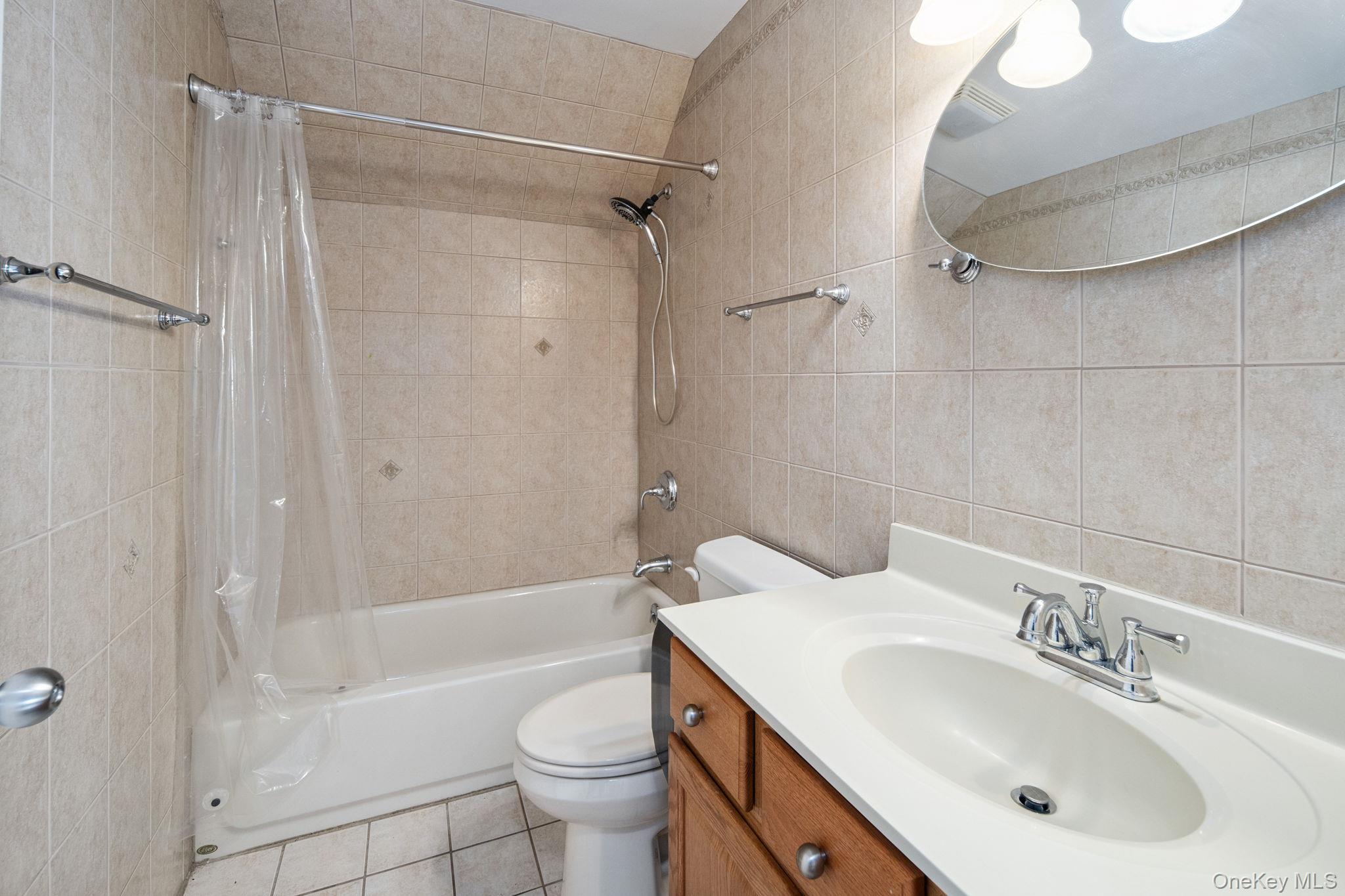 66 Highland Lake Road Eldred, NY 12732 - Photo 40 of 50 a bathroom with a sink toilet and shower