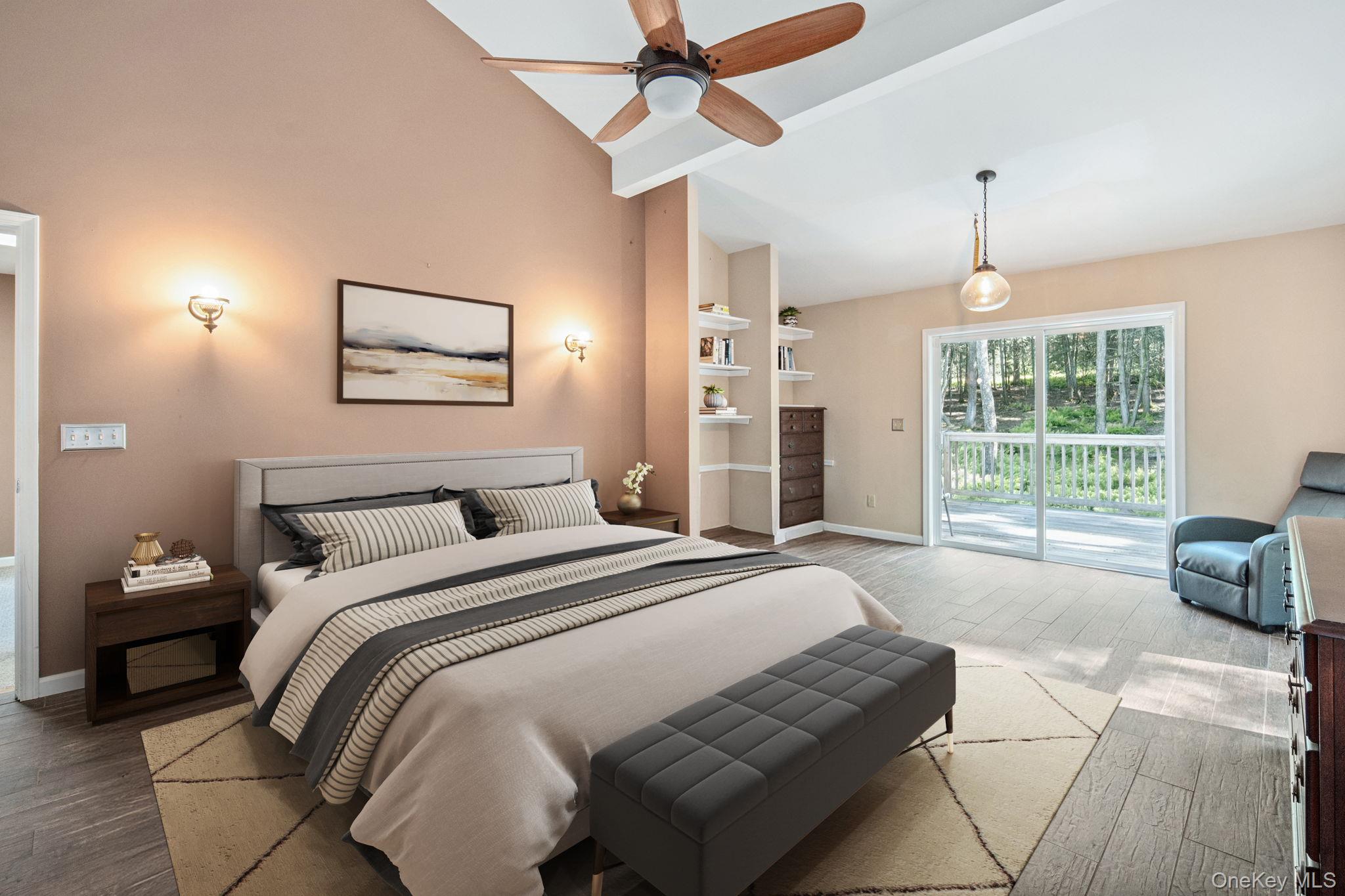 66 Highland Lake Road Eldred, NY 12732 - Photo 44 of 50 a spacious bedroom with a bed and a window