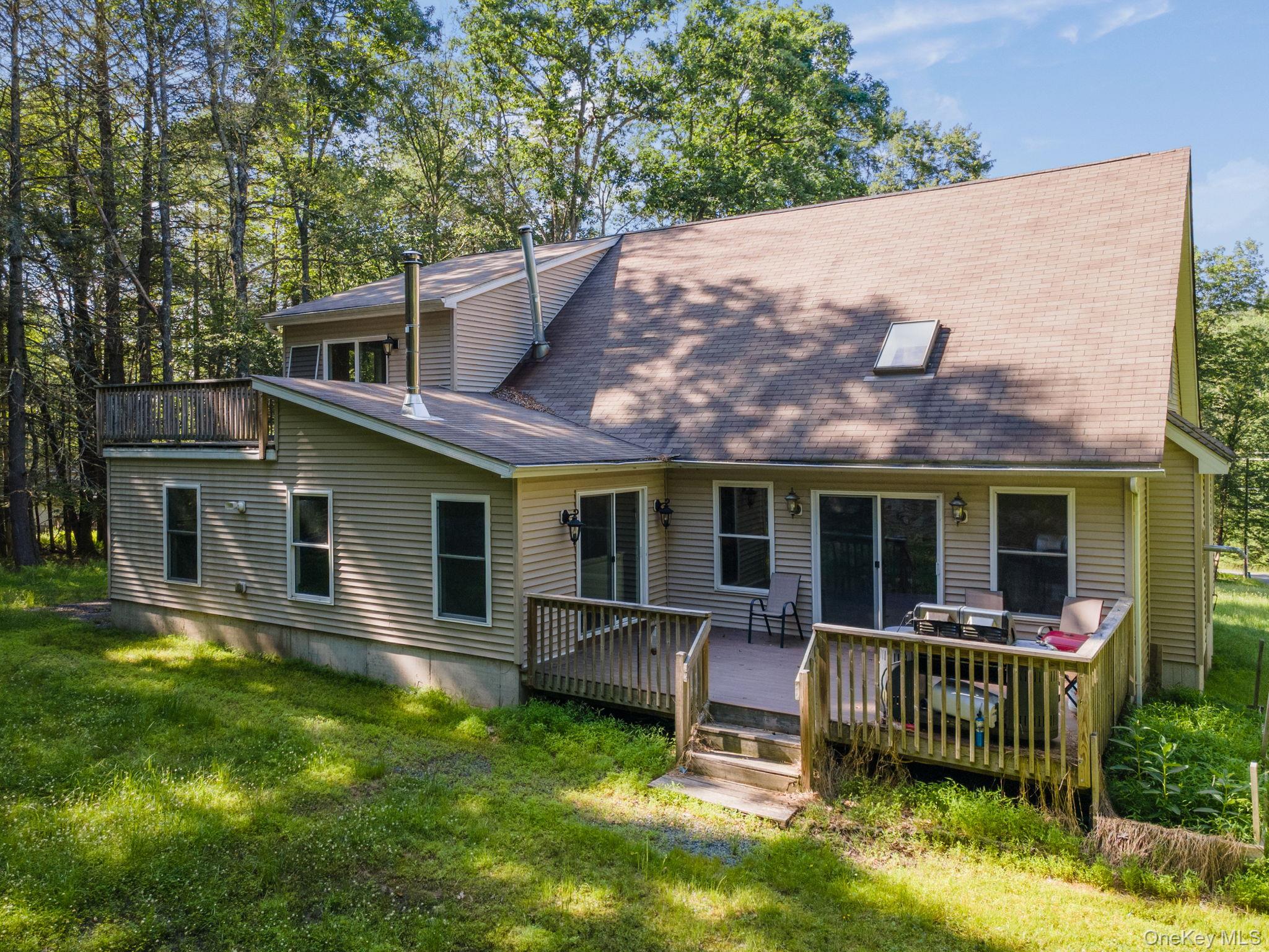 66 Highland Lake Road Eldred, NY 12732 - Photo 49 of 50 front view of house with a yard