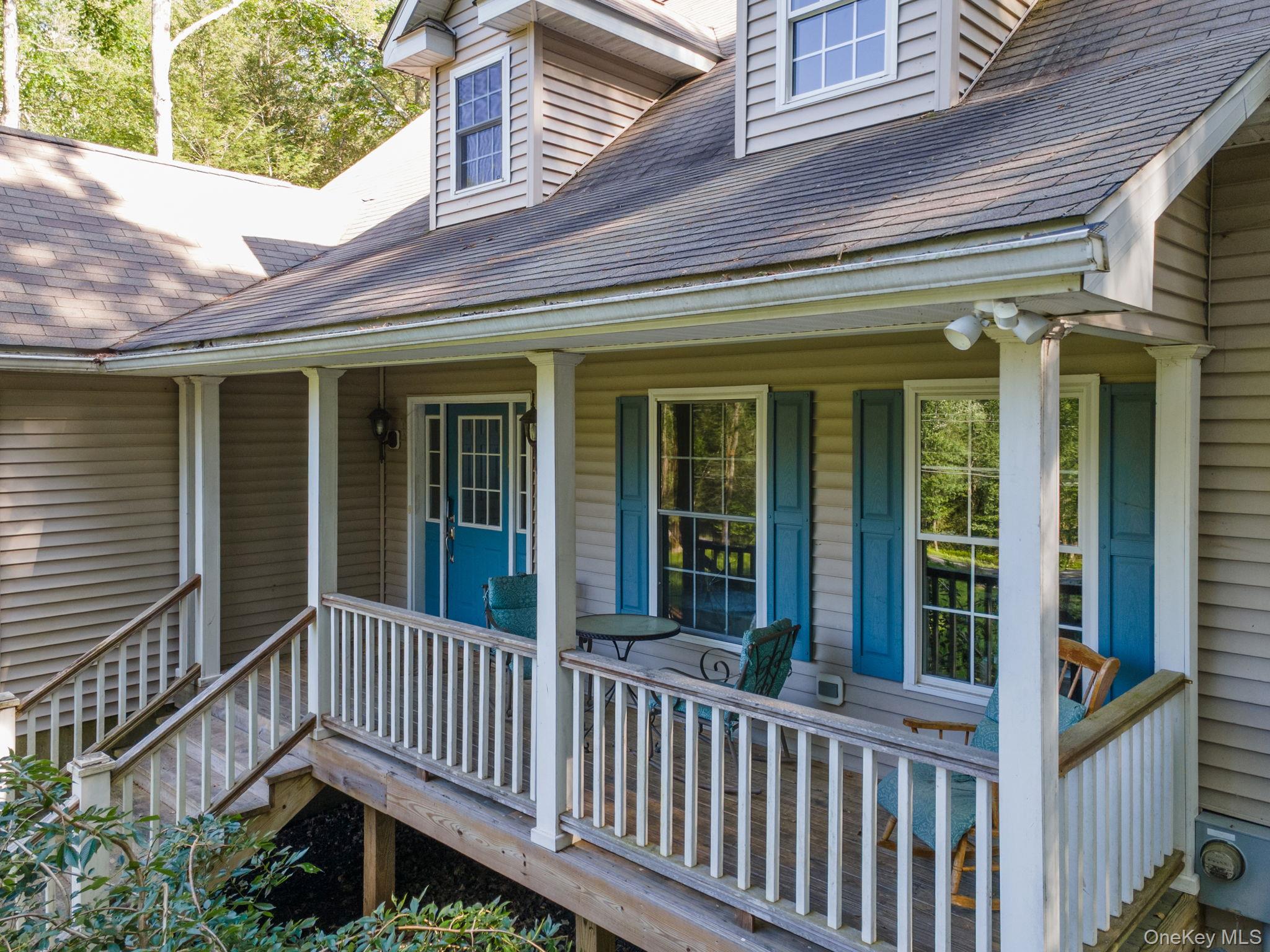 66 Highland Lake Road Eldred, NY 12732 - Photo 5 of 50 a view of a brick house with a window