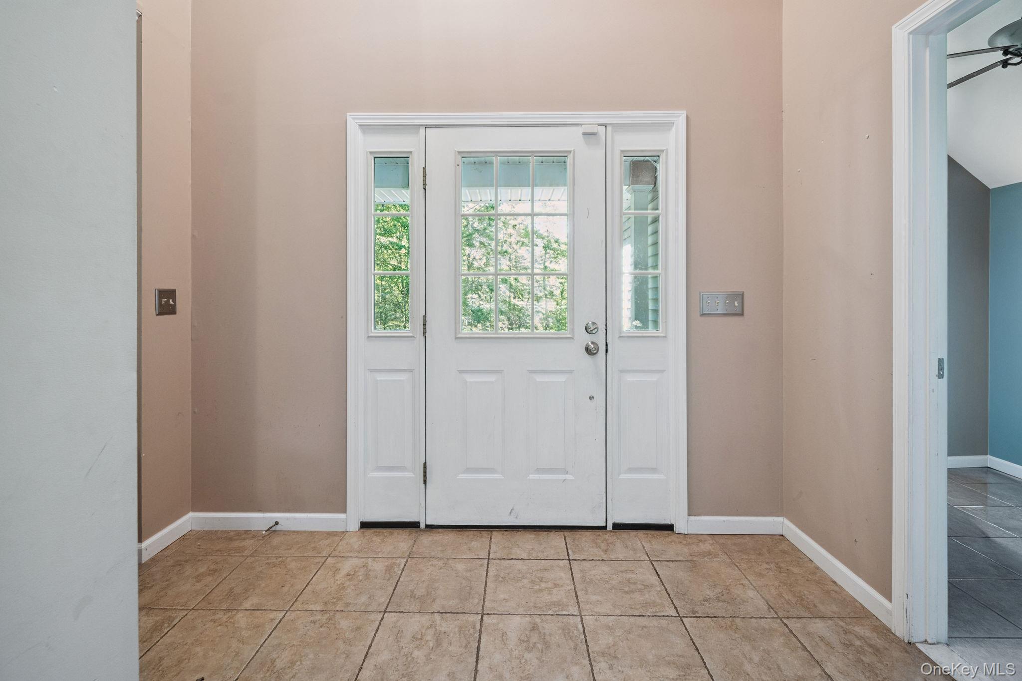 66 Highland Lake Road Eldred, NY 12732 - Photo 7 of 50 a view of an empty room with closet and a window