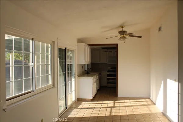 a view of a walk in closet and bathroom