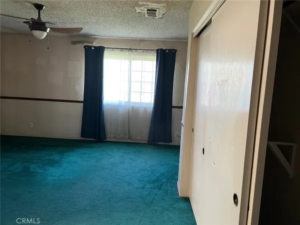 an empty room with closet