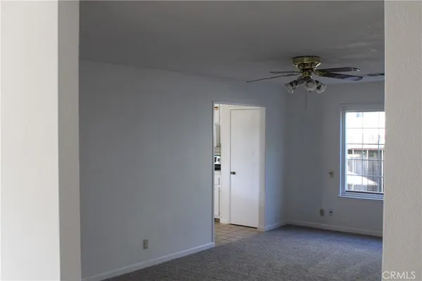 a view of a window in an empty room