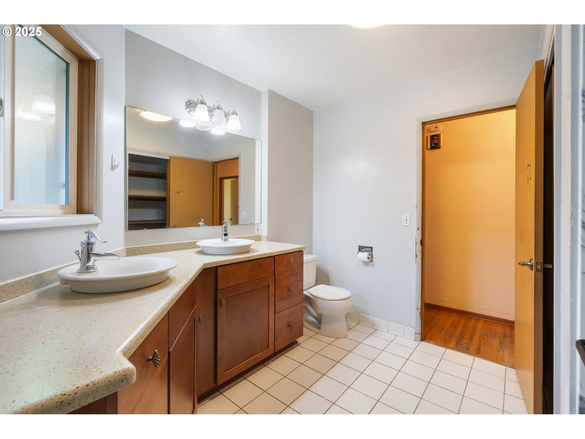 11010 Southeast Salmon Street Portland, OR 97216 - Photo 31 of 42 a bathroom with a sink and a mirror