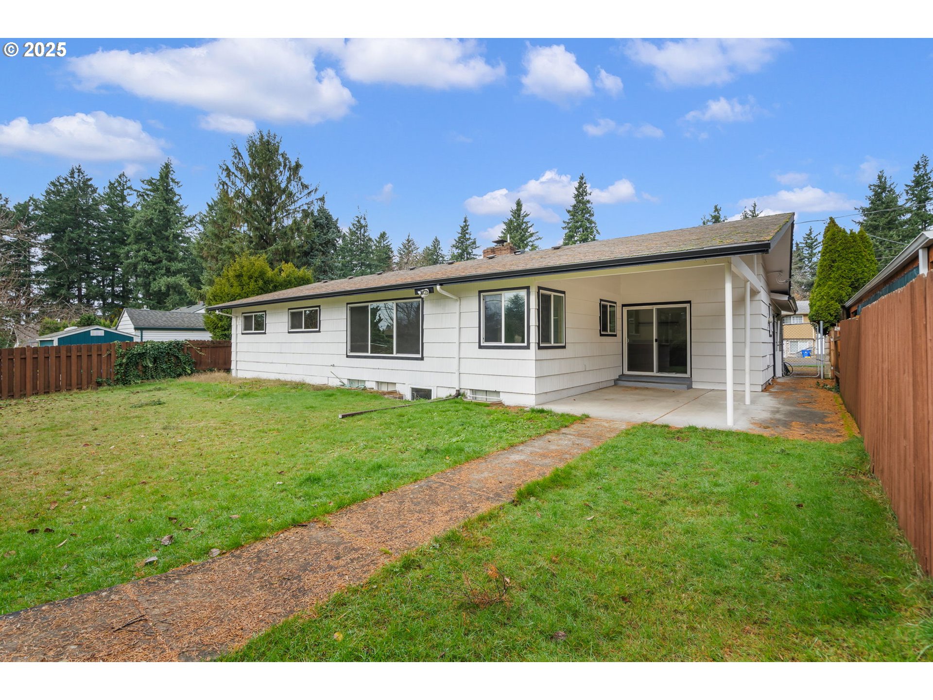 11010 Southeast Salmon Street Portland, OR 97216 - Photo 39 of 42 a view of a house with a backyard