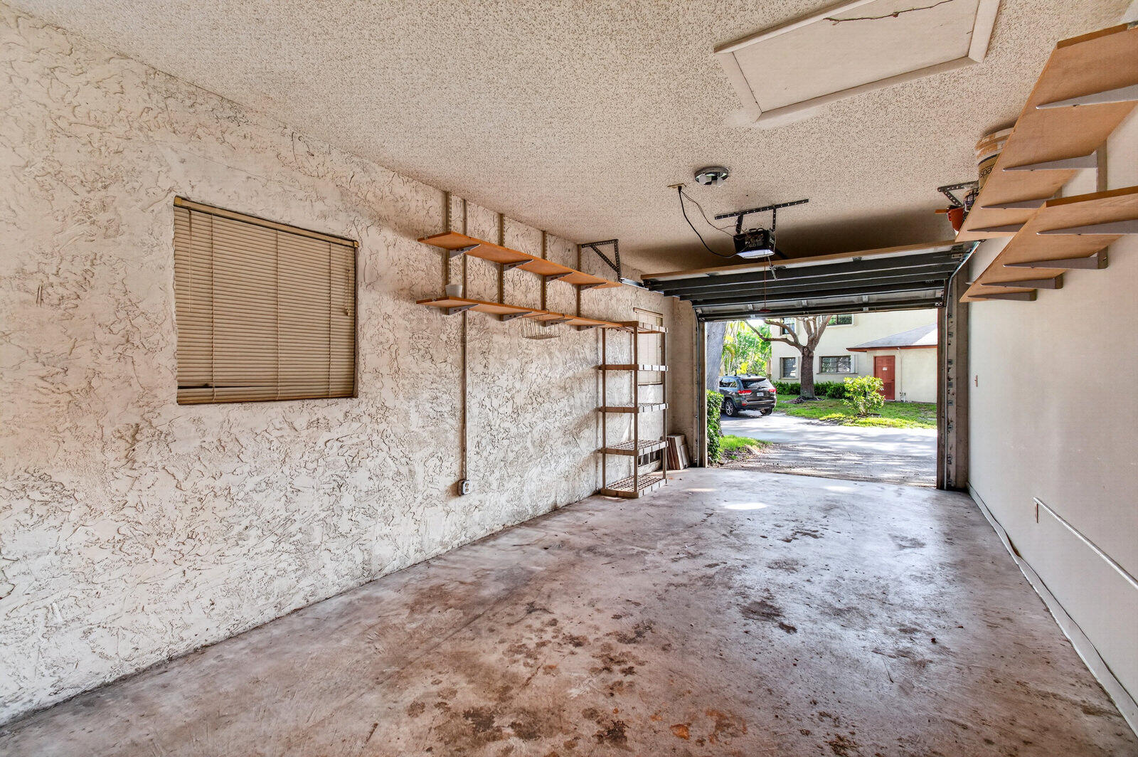 3951 Northeast 19th Road, Unit 1701 Pompano Beach, FL 33064 - Photo 61 of 82 a view of a back yard of the house