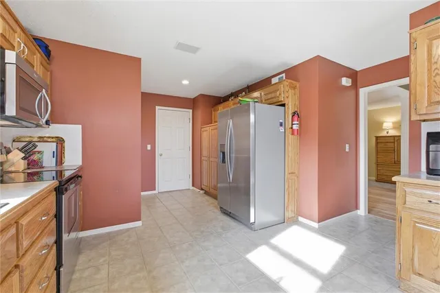 $409,000 | 1009 Southwest Blazing Star Drive, Lee's Summit, MO 64081