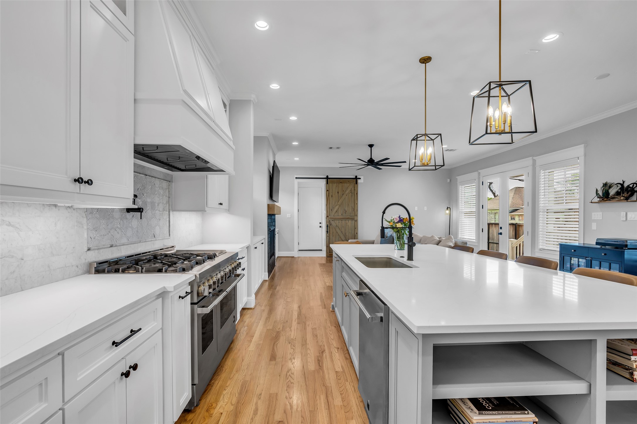 800 Walton Street Houston, TX 77009 - Photo 13 of 38 Another view of the kitchen shows how it opens up to the family room, creating a seamless flow between cooking and entertaining spaces.
