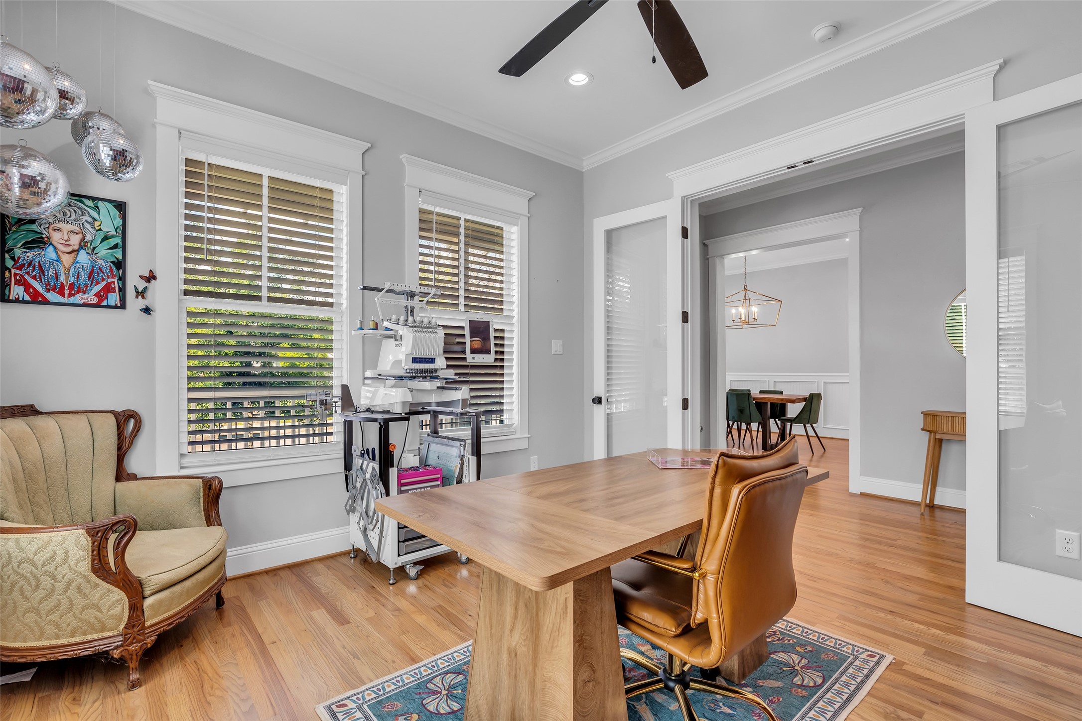 800 Walton Street Houston, TX 77009 - Photo 5 of 38 From the home office, you can see a glimpse of the formal dining room and the foyer that connects the two spaces, highlighting the open flow of the layout.