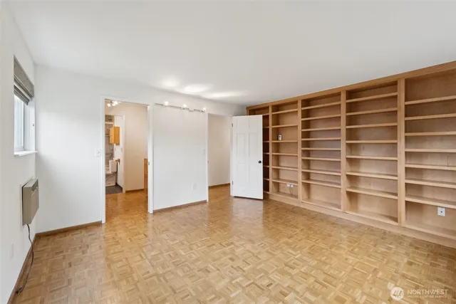 a view of an empty room with a empty shelves