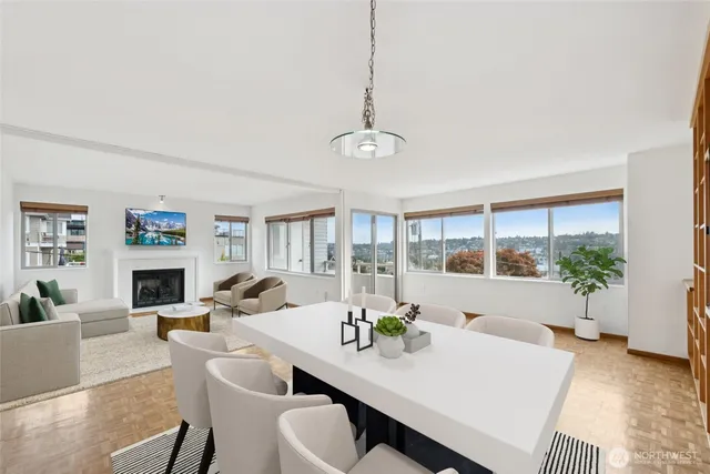 a view of a dining room with furniture window and outside view