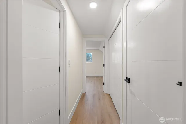 a view of a bathroom from the hallway