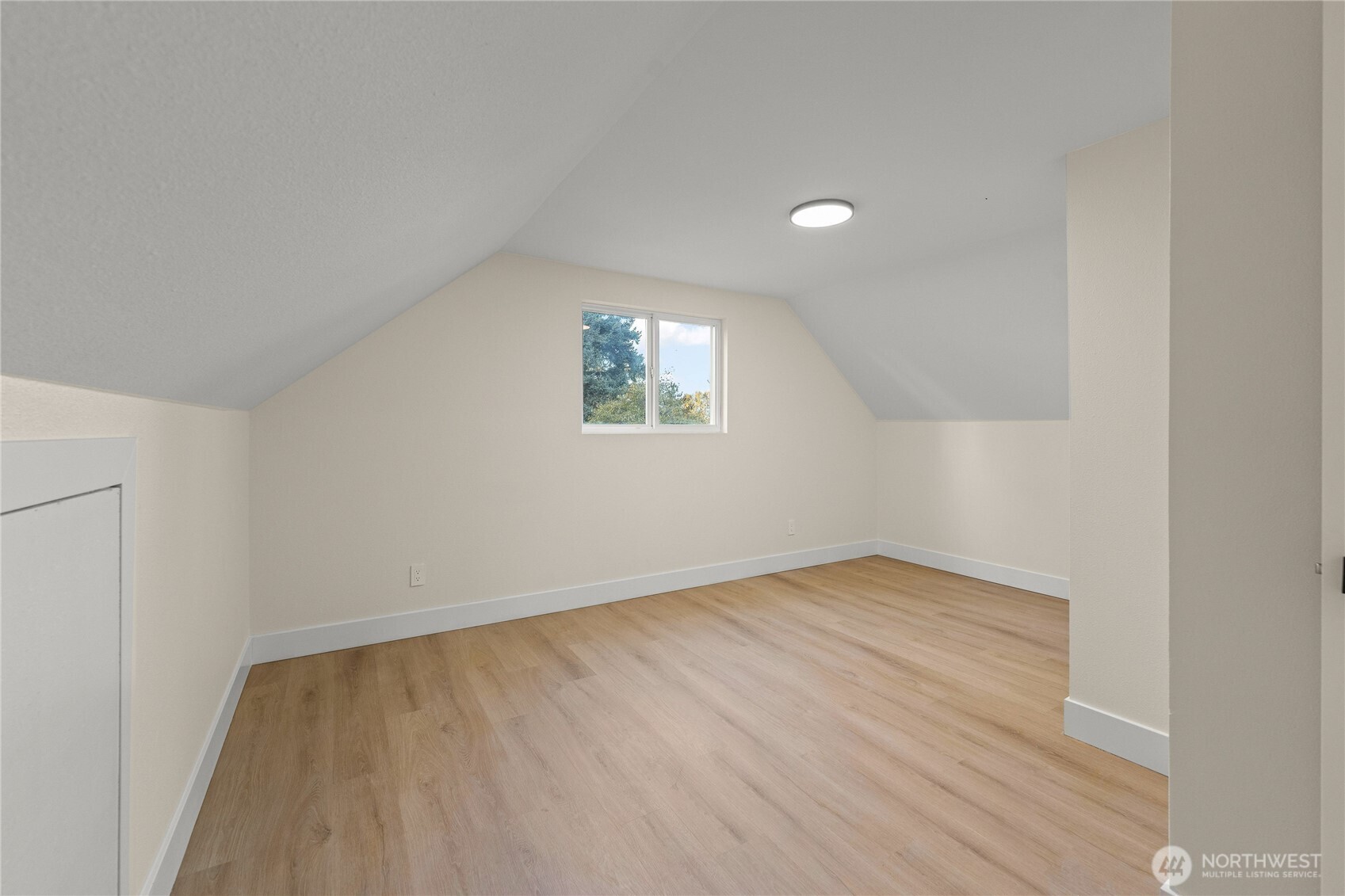 29628 22nd Avenue South Federal Way, WA 98003 - Photo 19 of 40 an empty room with wooden floor and windows