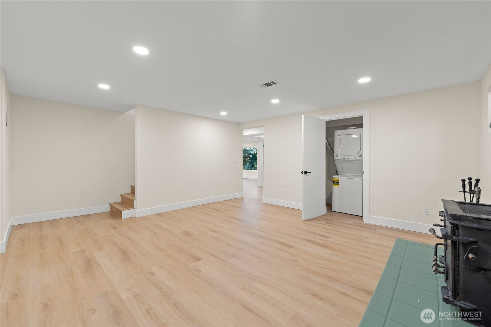 29628 22nd Avenue South Federal Way, WA 98003 - Photo 24 of 40 a view of an empty room with wooden floor