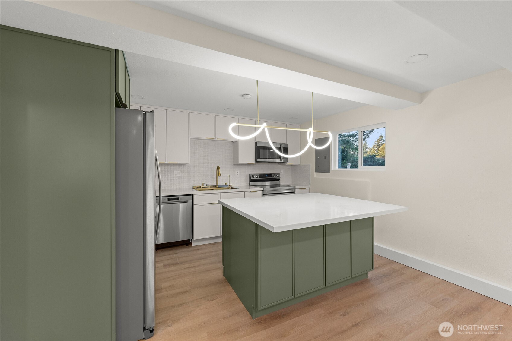 29628 22nd Avenue South Federal Way, WA 98003 - Photo 28 of 40 a kitchen with a sink cabinets and wooden floor