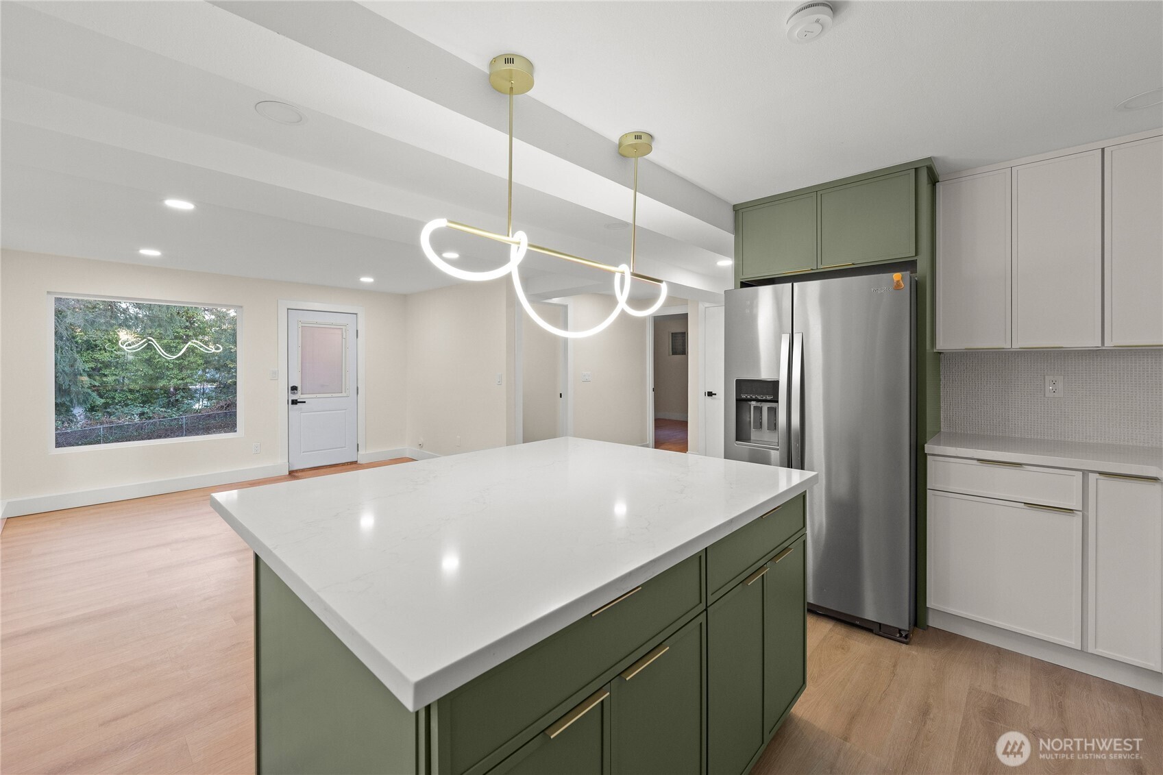 29628 22nd Avenue South Federal Way, WA 98003 - Photo 30 of 40 a kitchen with a refrigerator a oven a sink and a window