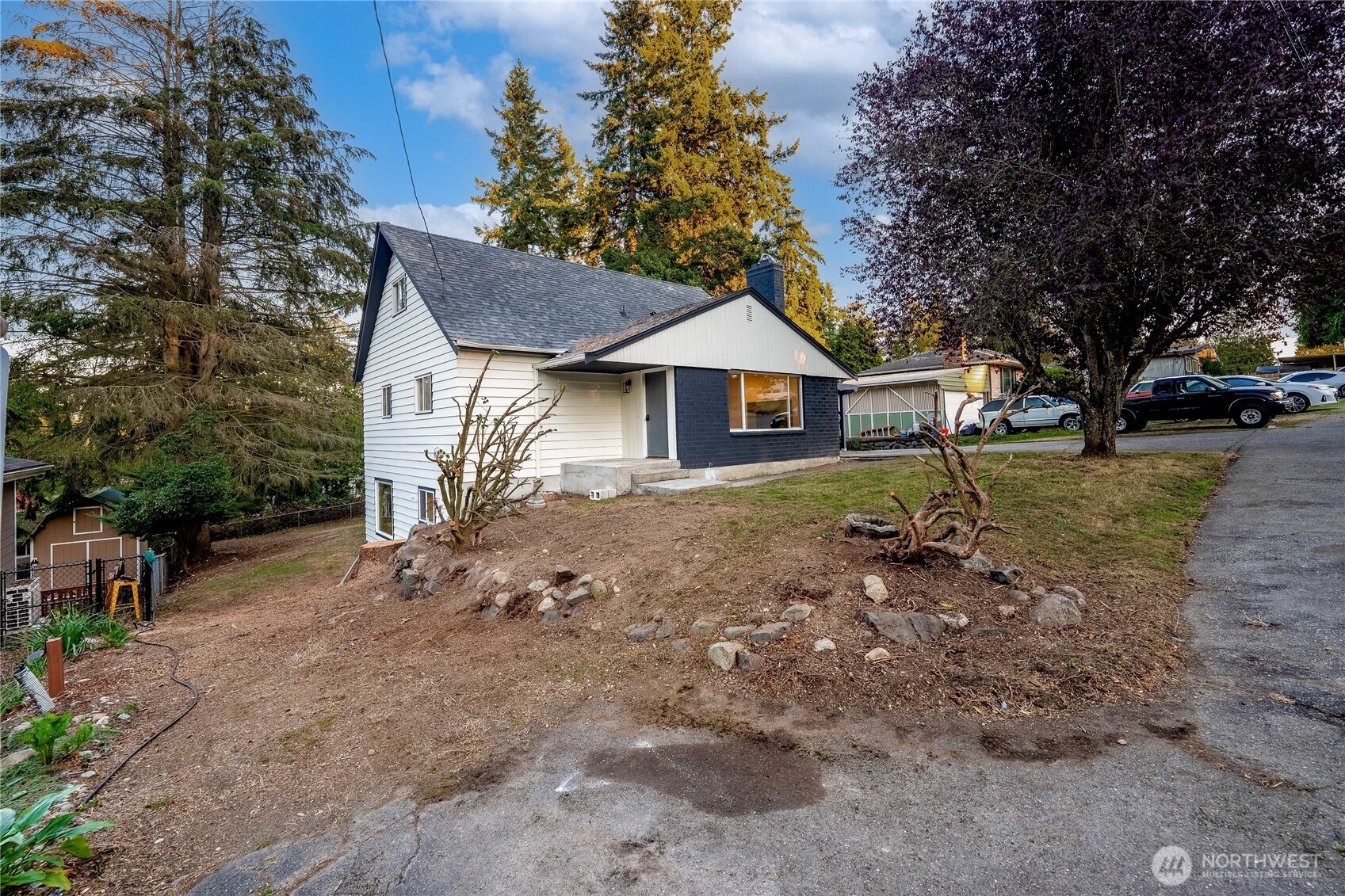 29628 22nd Avenue South Federal Way, WA 98003 - Photo 4 of 40 a house with a tree in the background