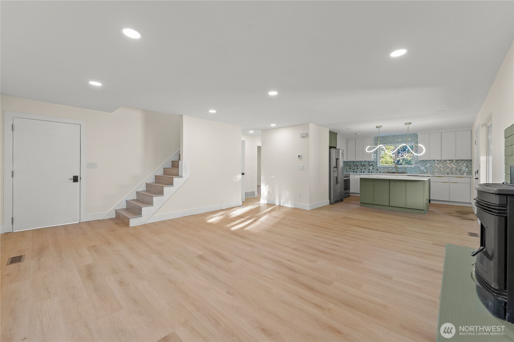 29628 22nd Avenue South Federal Way, WA 98003 - Photo 6 of 40 a view of a kitchen with a sink and a stove top oven