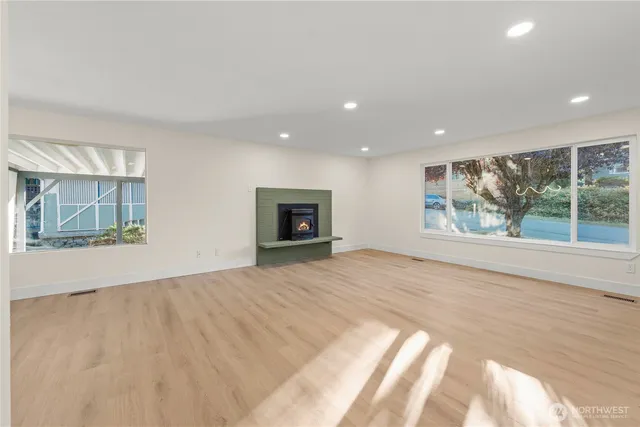 a view of an empty room with a window