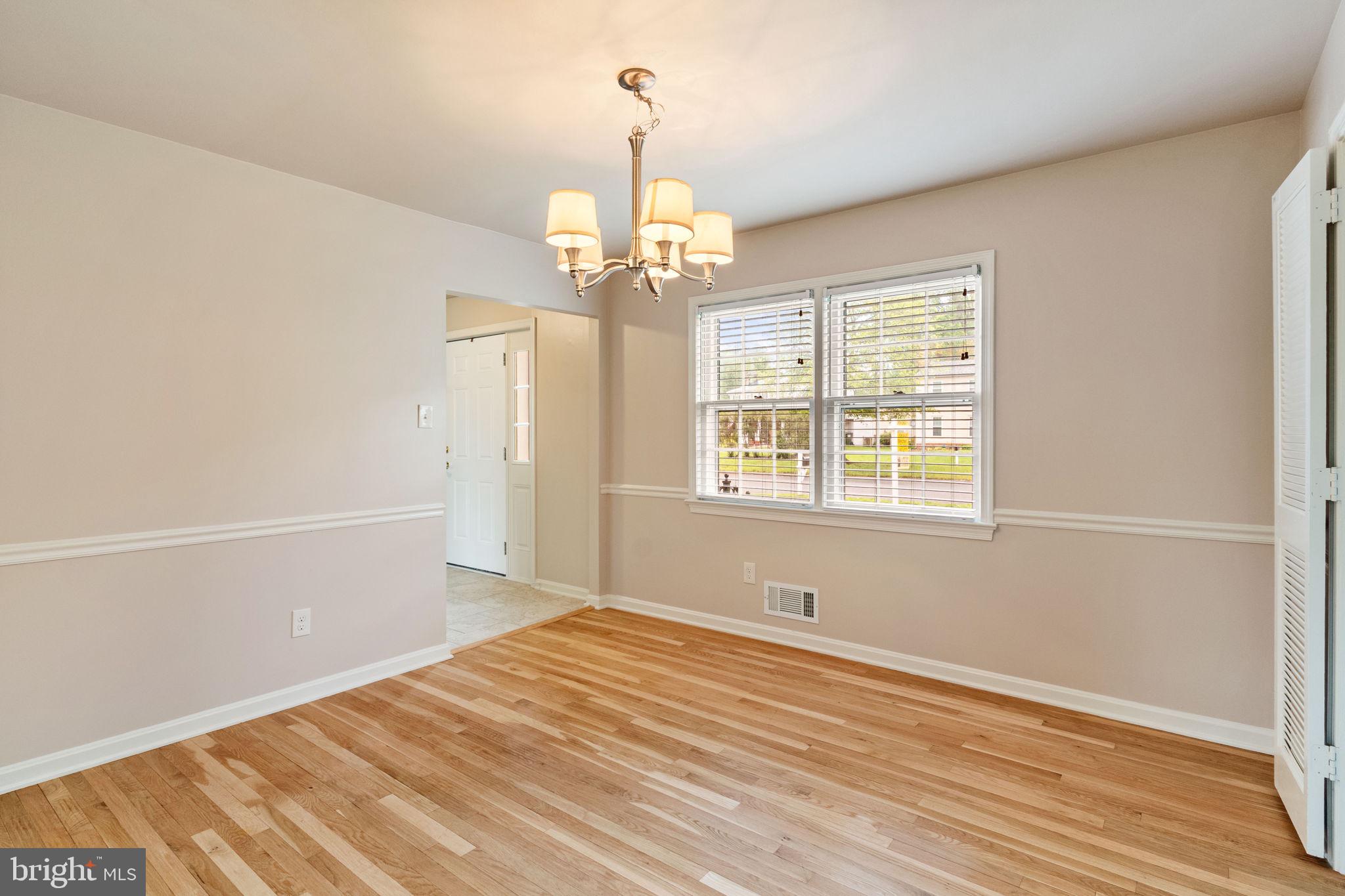 7619 Hayfield Road Alexandria, VA 22315 - Photo 19 of 60 Formal Dining room with wood floors