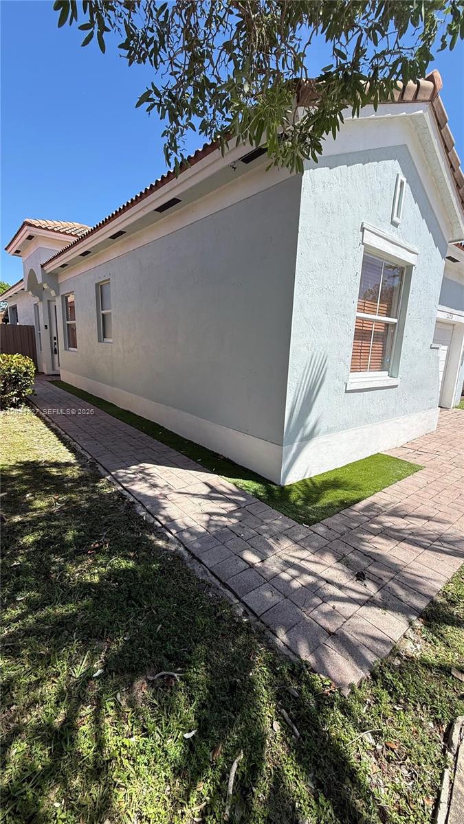 2120 Northeast 37th Road, Unit 1 Homestead, FL 33033 - Photo 10 of 30 a view of a backyard of the house