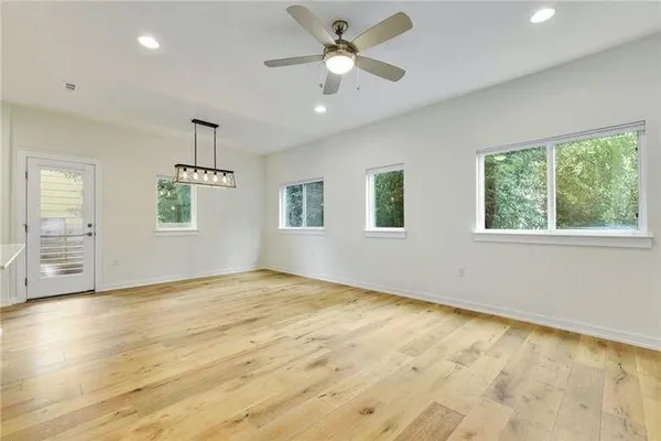 a view of an empty room with a window