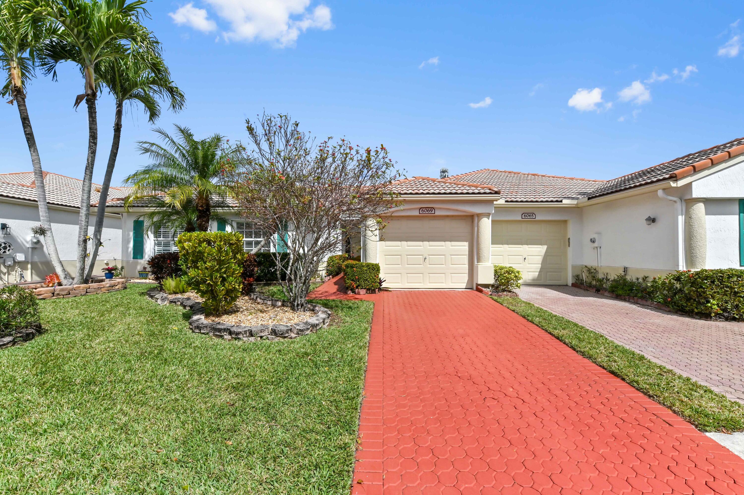 6069 Heliconia Road Delray Beach, FL 33484 - Photo 1 of 56 02 front 02