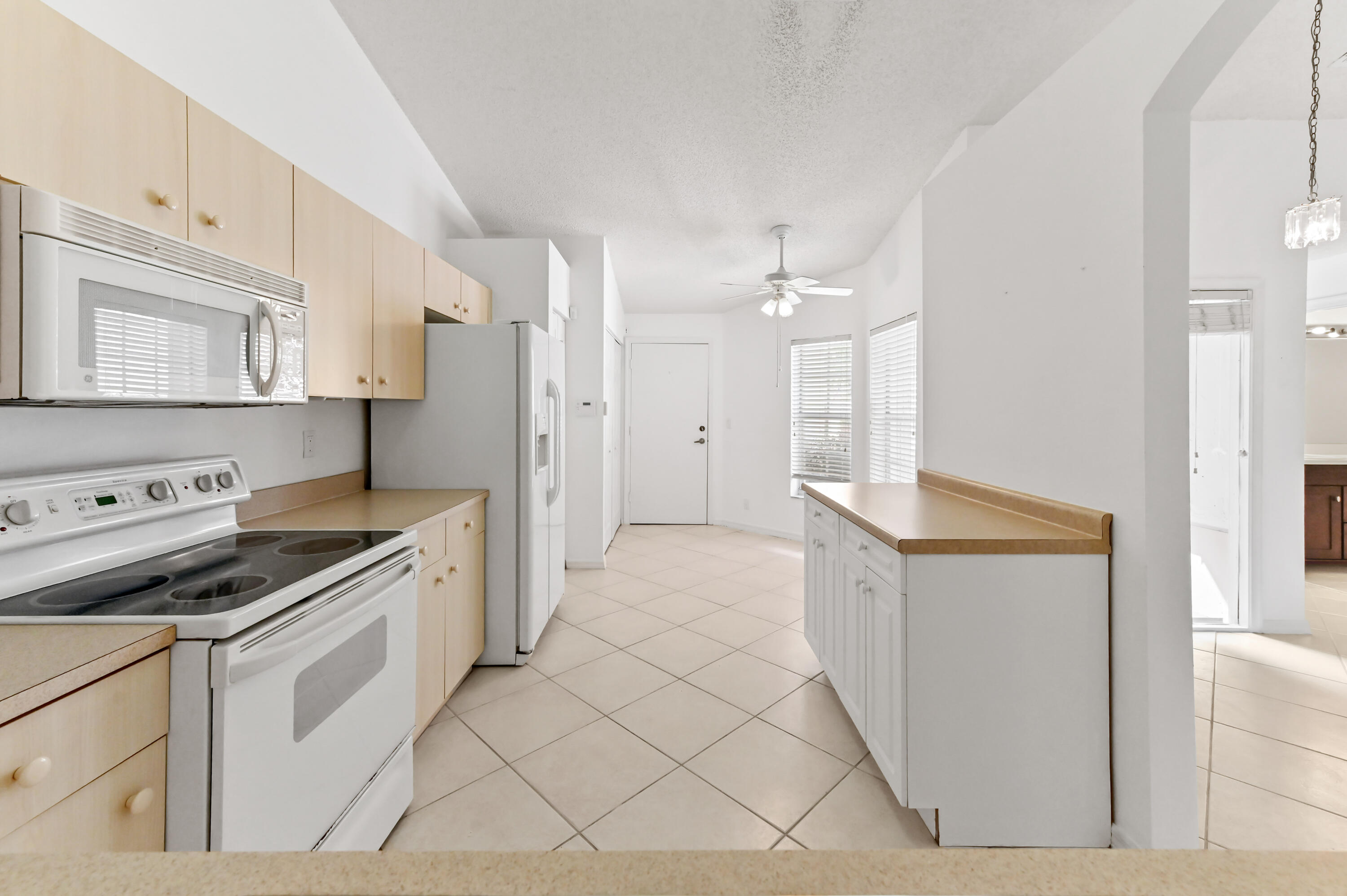 6069 Heliconia Road Delray Beach, FL 33484 - Photo 11 of 56 12 kitchen 02