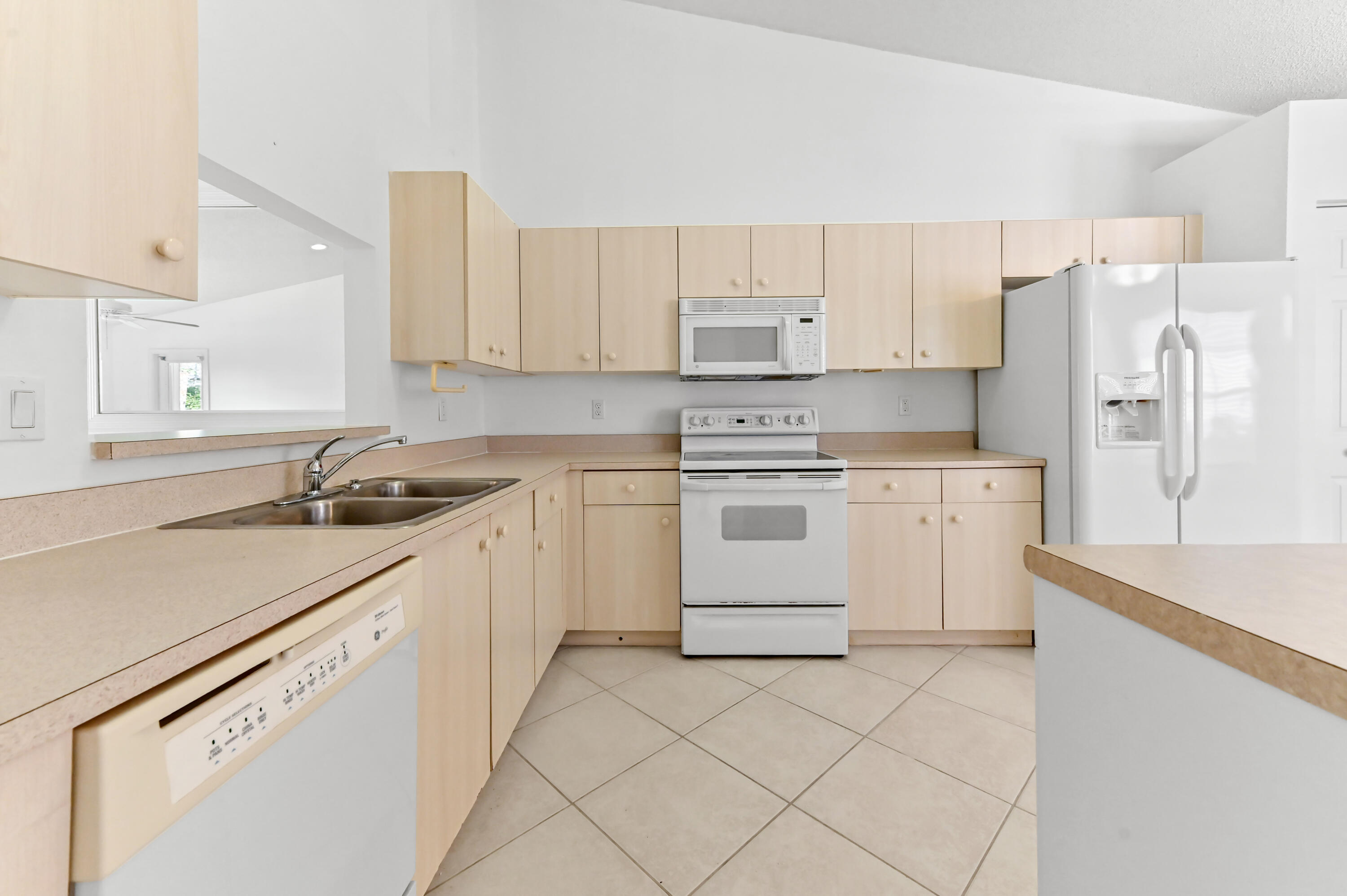 6069 Heliconia Road Delray Beach, FL 33484 - Photo 12 of 56 13 kitchen 03