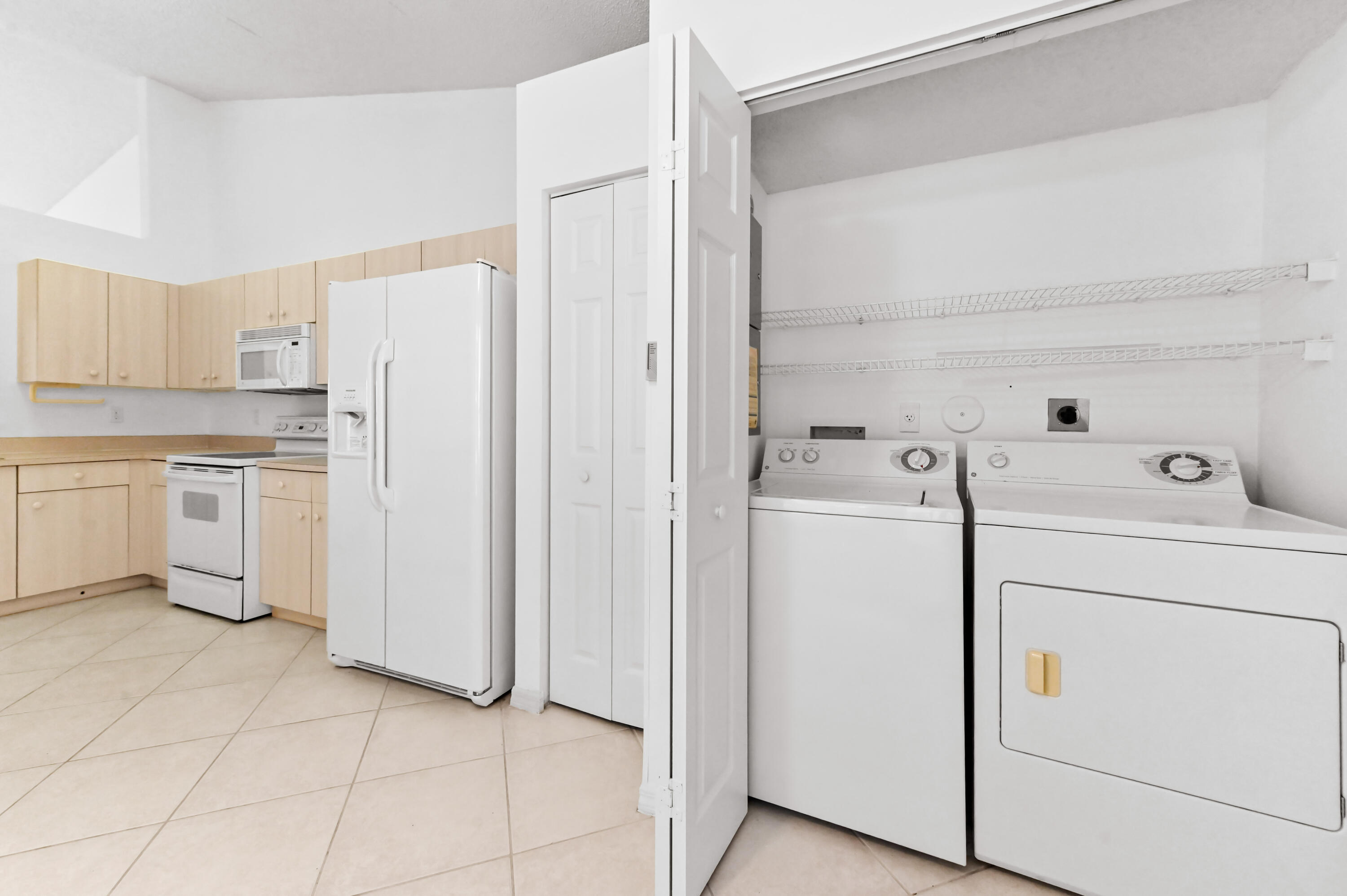 6069 Heliconia Road Delray Beach, FL 33484 - Photo 14 of 56 15 laundry 02