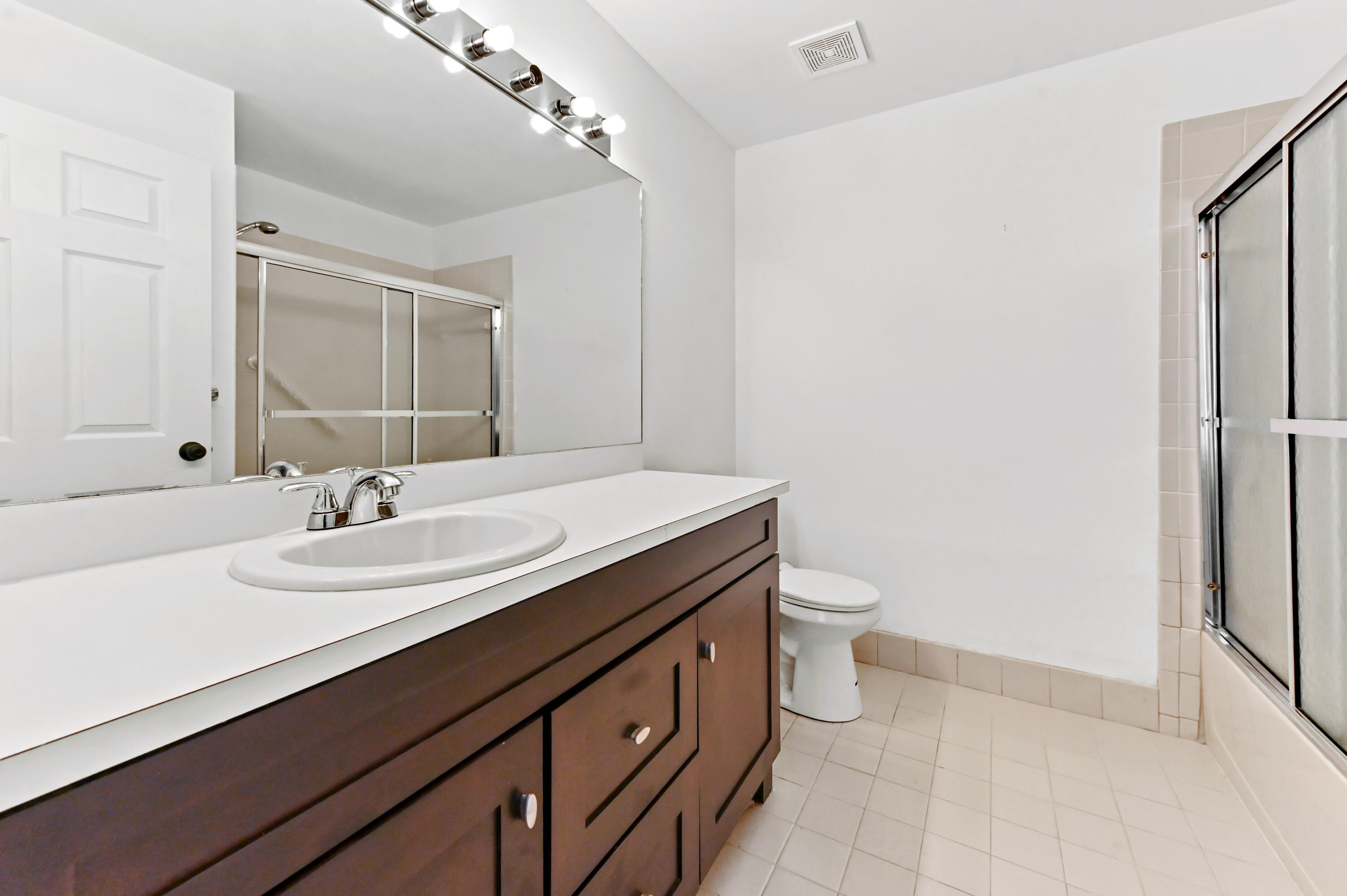6069 Heliconia Road Delray Beach, FL 33484 - Photo 16 of 56 17 bathroom 01