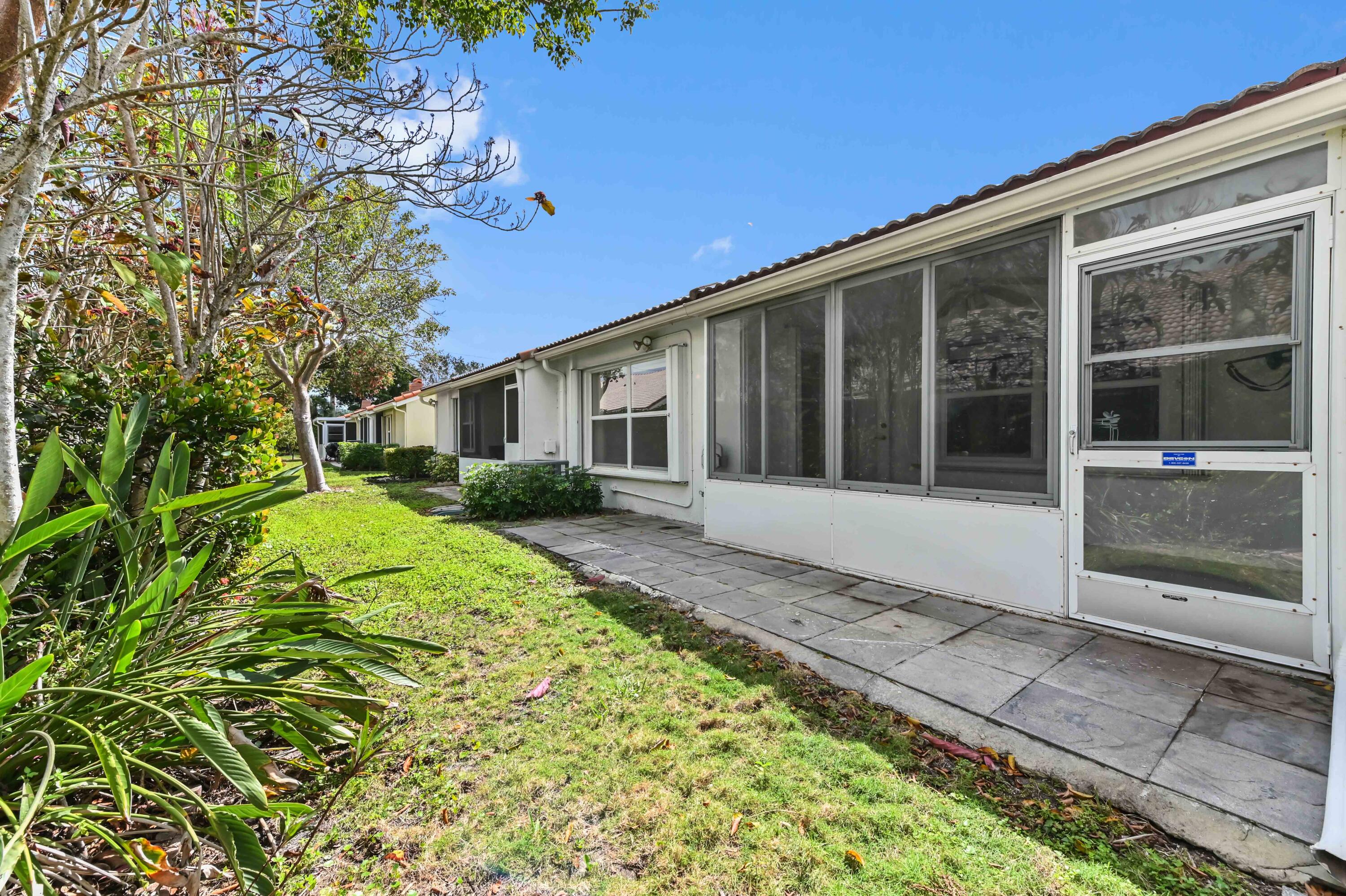 6069 Heliconia Road Delray Beach, FL 33484 - Photo 27 of 56 28 Rear 02