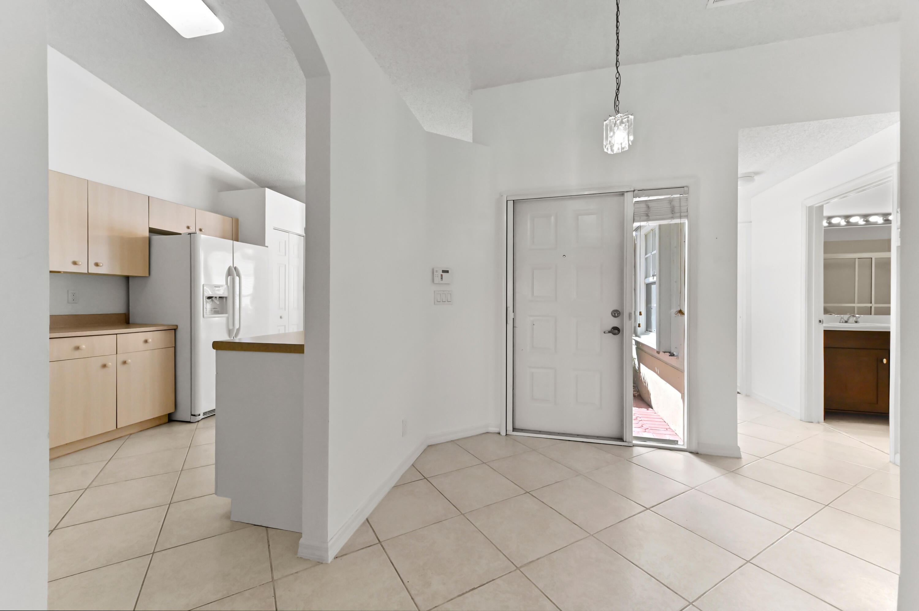 6069 Heliconia Road Delray Beach, FL 33484 - Photo 4 of 56 05 foyer 02