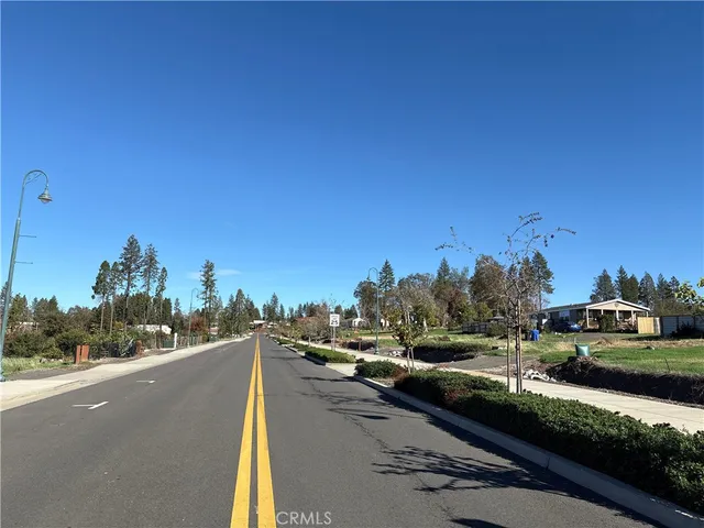 a view of a city street from a balcony