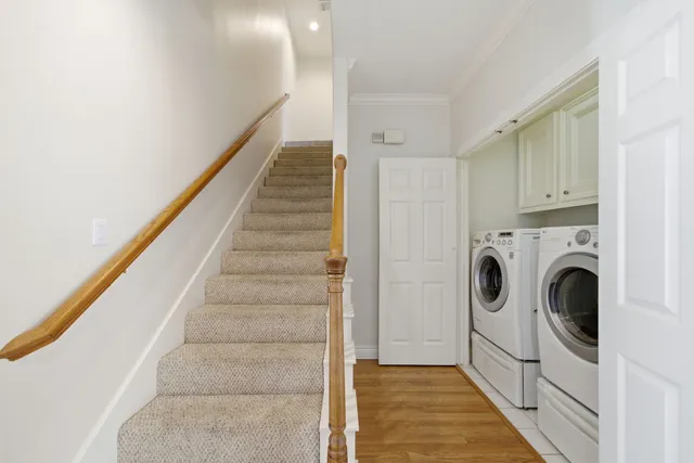 a view of a kitchen with washer and dryer