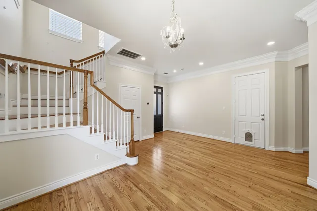 a view of entryway with wooden floor