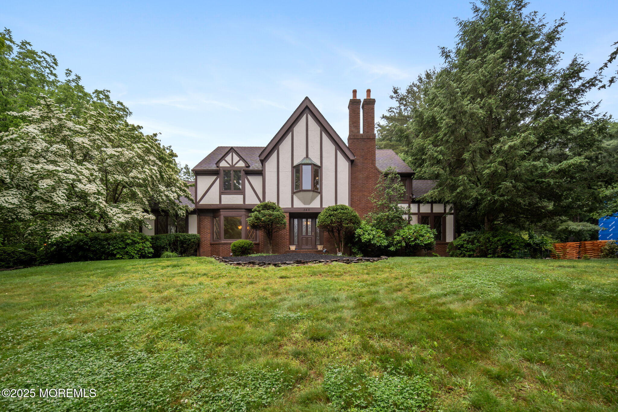 245 Borden Road Middletown, NJ 07748 - Photo 2 of 72 a big house with a big yard and large trees