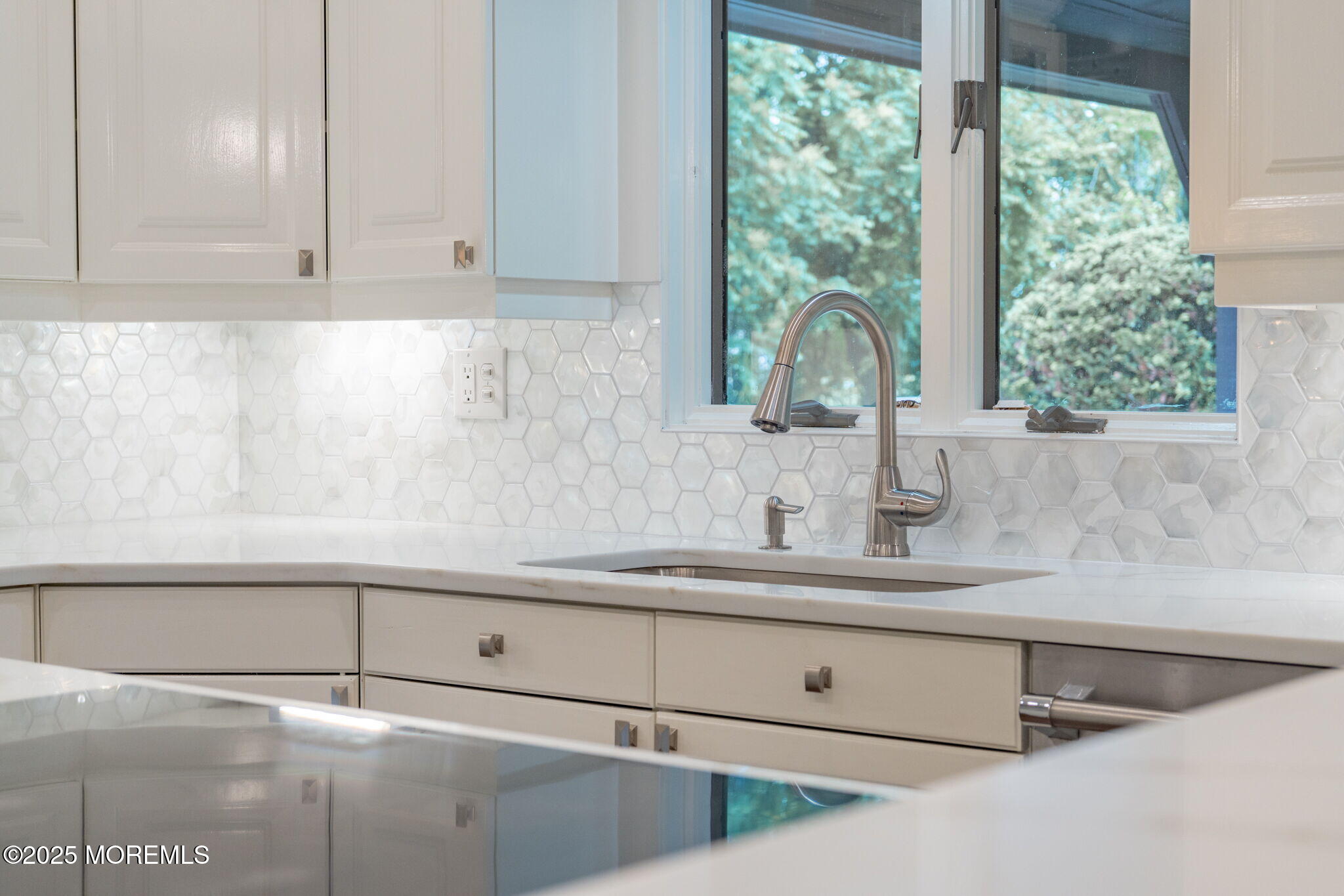 245 Borden Road Middletown, NJ 07748 - Photo 24 of 72 a close view of sink and tap